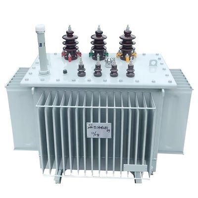 विद्युत ट्रांसफार्मर 11kV 12kV 400V 100kVA 200kVA 500kVA तांबा/एल्यूमीनियम सामग्री के साथ